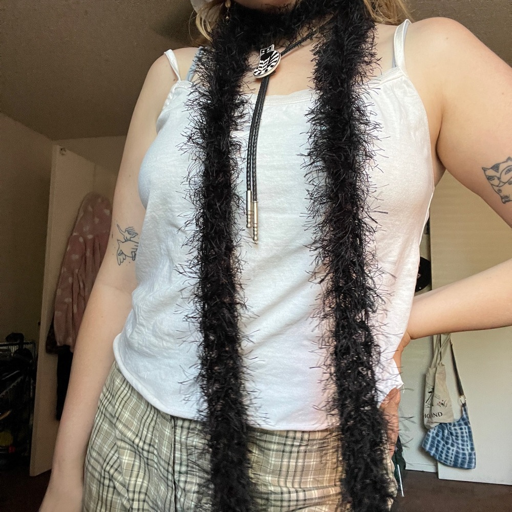 Black fuzzy y2k inspired scarf
80 in long